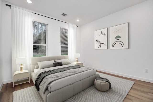 bedroom featuring dark wood-type flooring