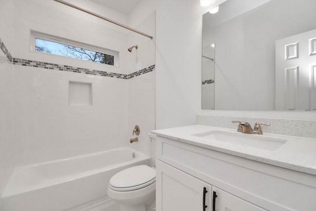 full bathroom with vanity, shower / bathtub combination, and toilet