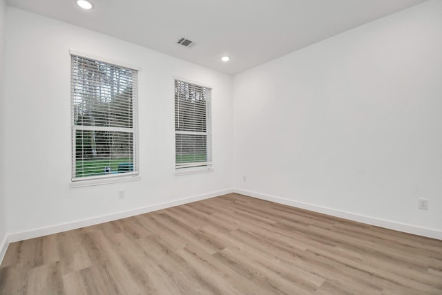 empty room featuring light hardwood / wood-style floors