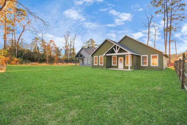 view of front of home with a front yard