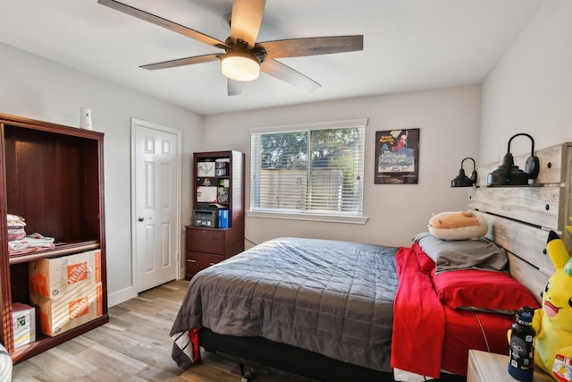 bedroom featuring ceiling fan and light hardwood / wood-style floors