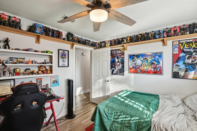 bedroom featuring ceiling fan and light hardwood / wood-style floors