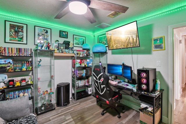 office area featuring hardwood / wood-style flooring and ceiling fan