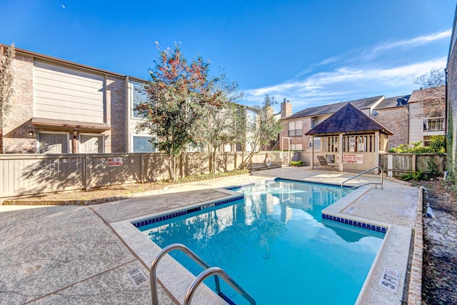 view of pool featuring a gazebo and a patio area