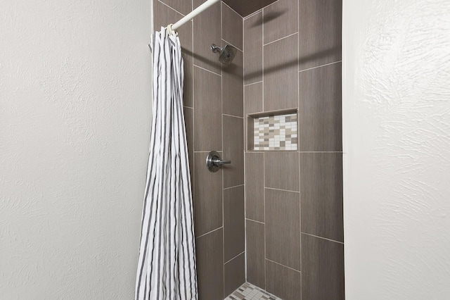 bathroom with curtained shower