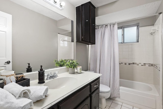 full bathroom featuring toilet, vanity, tile patterned floors, and shower / tub combo with curtain