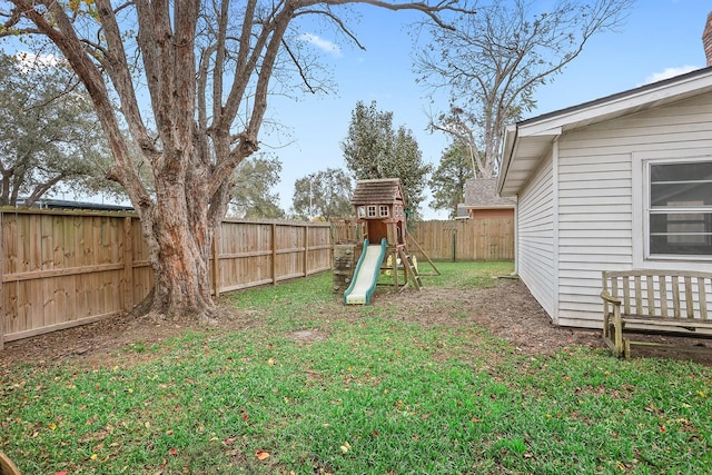 view of yard with a playground