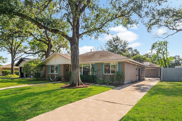 ranch-style home with a front lawn