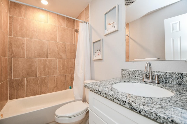 full bath featuring toilet, shower / tub combo, visible vents, and vanity