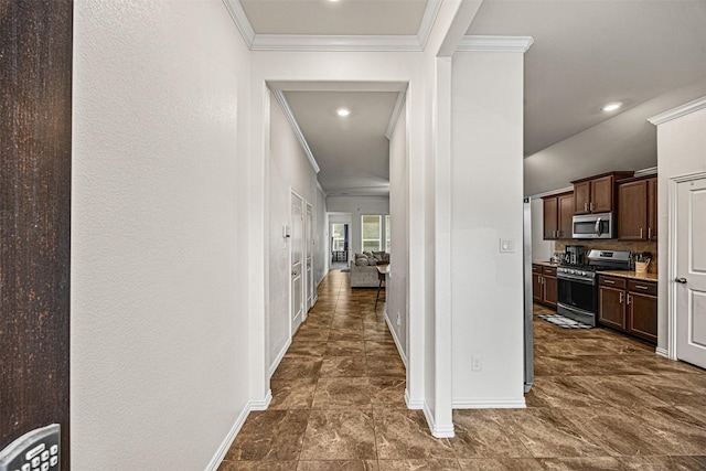 hall featuring ornamental molding