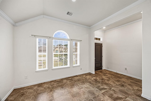 empty room with ornamental molding and lofted ceiling