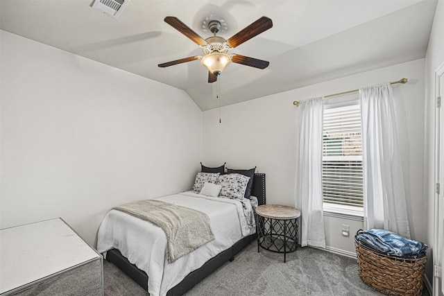 carpeted bedroom featuring ceiling fan and lofted ceiling