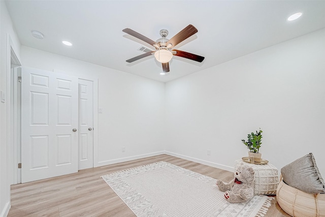 unfurnished room featuring ceiling fan and light hardwood / wood-style floors