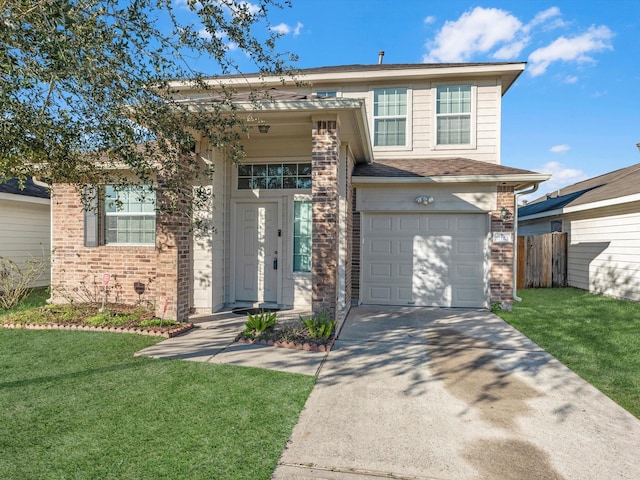 view of front of property featuring a garage and a front lawn