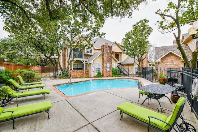 view of pool with a patio area