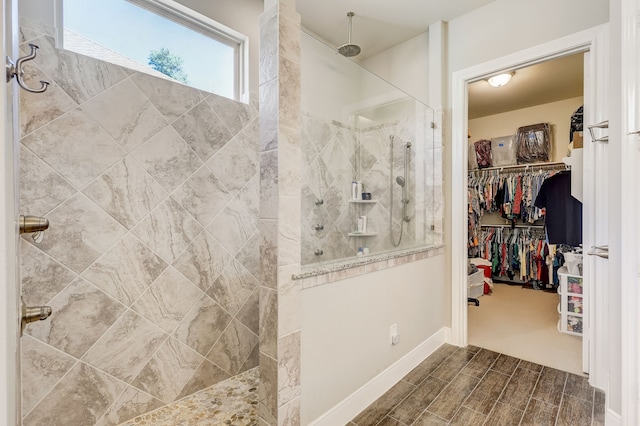 bathroom featuring tiled shower