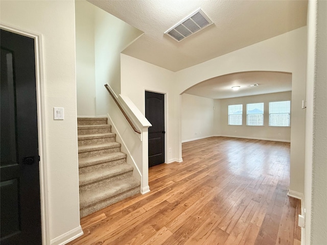 entrance foyer with light wood-type flooring