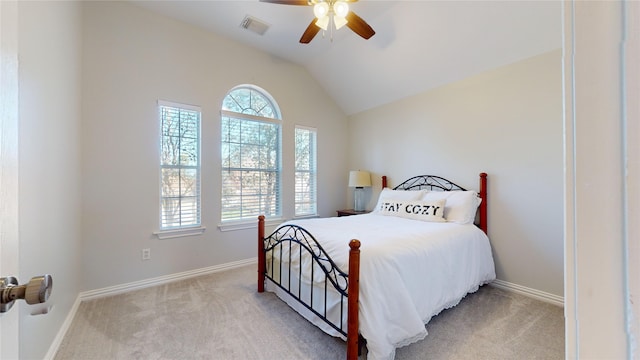 carpeted bedroom featuring ceiling fan and lofted ceiling