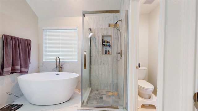 bathroom featuring separate shower and tub, tile walls, and toilet