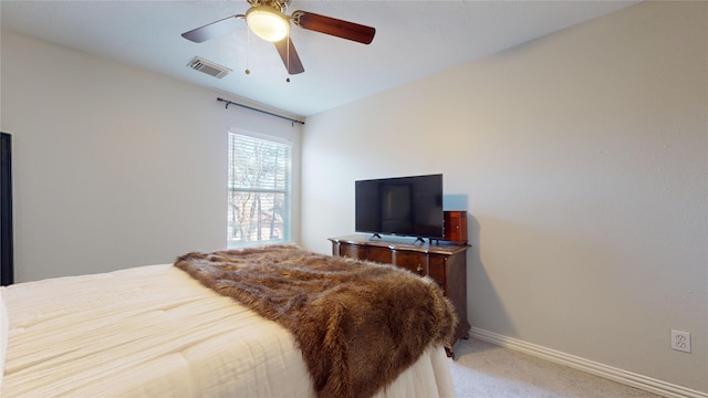 bedroom featuring ceiling fan and light colored carpet