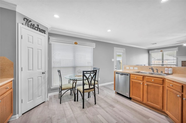 kitchen with crown molding, dishwasher, ceiling fan, and sink