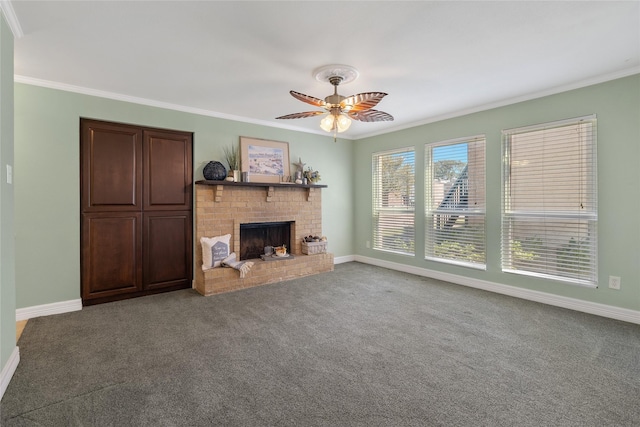 unfurnished living room with carpet flooring, a brick fireplace, ceiling fan, and crown molding