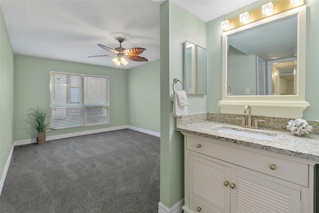 bathroom featuring vanity and ceiling fan