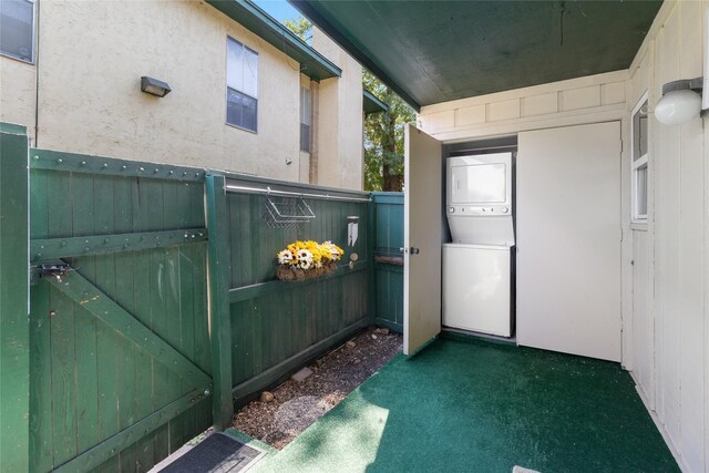 view of gate with washer / dryer