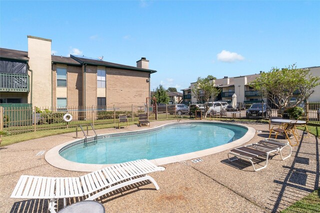 view of pool with a patio area