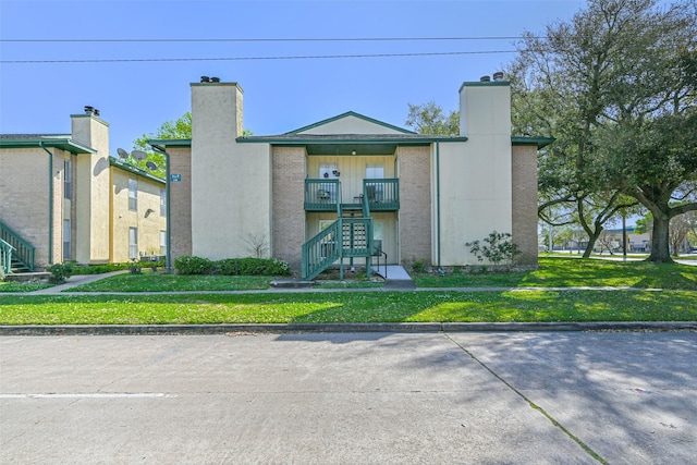 view of building exterior featuring stairway