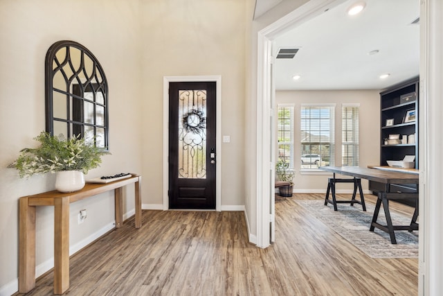 foyer with hardwood / wood-style floors