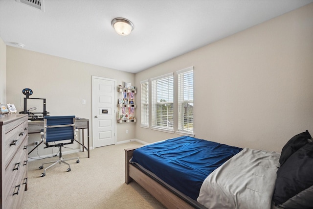 bedroom with light carpet