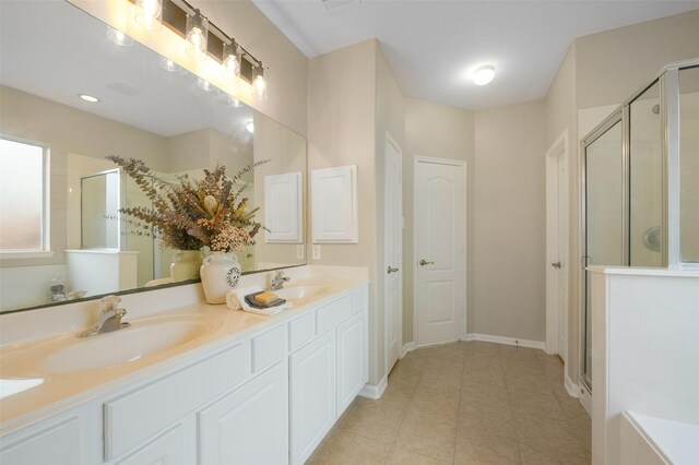 bathroom with vanity and an enclosed shower