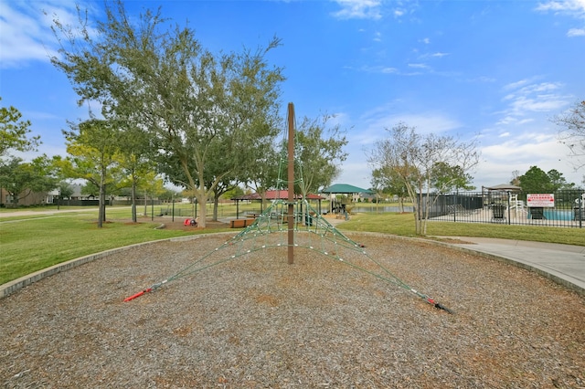 view of playground featuring a lawn