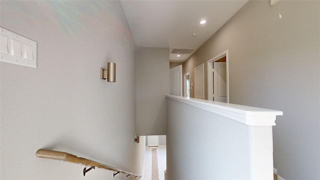 hall with visible vents and recessed lighting