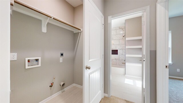 washroom featuring light carpet, washer hookup, gas dryer hookup, and hookup for an electric dryer