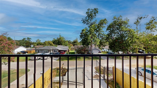 balcony featuring a residential view