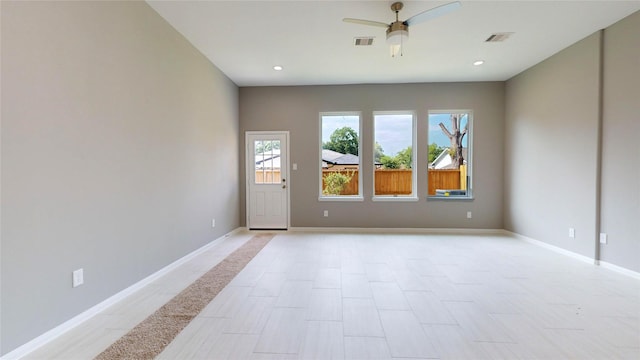 empty room featuring ceiling fan