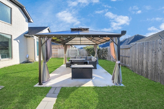 view of yard featuring outdoor lounge area, a gazebo, and a patio