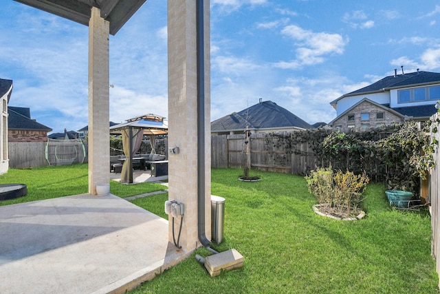 view of yard with a gazebo and a patio