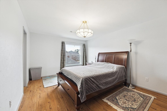 bedroom featuring light hardwood / wood-style flooring