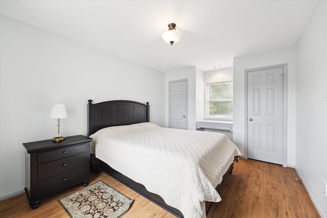 bedroom featuring hardwood / wood-style floors