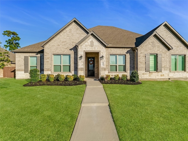 view of front of home with a front lawn