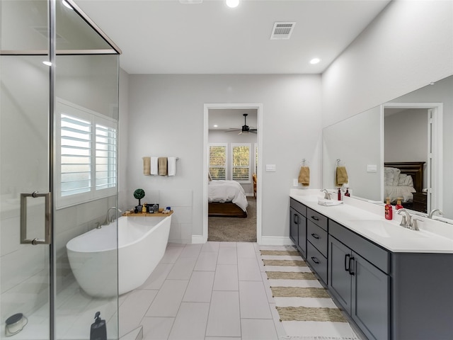 bathroom with tile patterned flooring, vanity, ceiling fan, and independent shower and bath