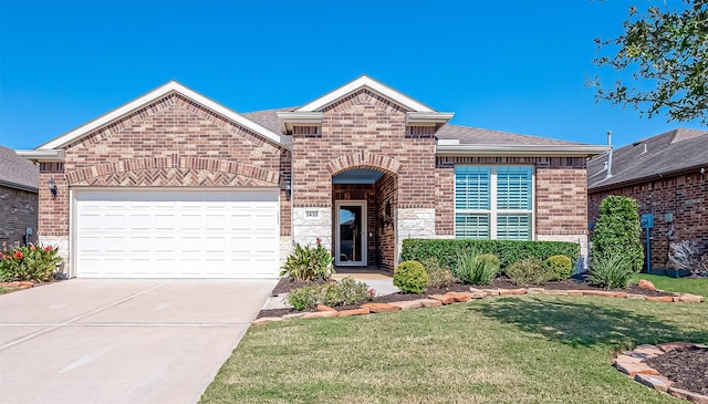 front of property with a front yard and a garage