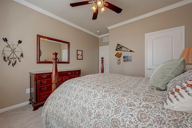 bedroom with ceiling fan, light colored carpet, and crown molding