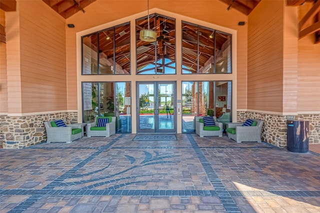 view of exterior entry featuring french doors