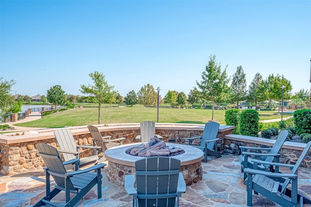 view of patio with an outdoor fire pit