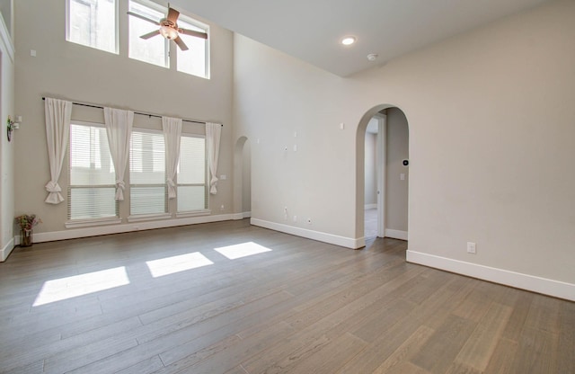 unfurnished room with light hardwood / wood-style floors and ceiling fan