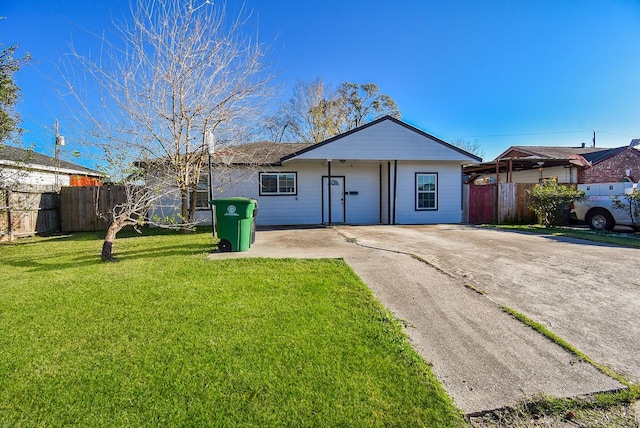 single story home with a front lawn